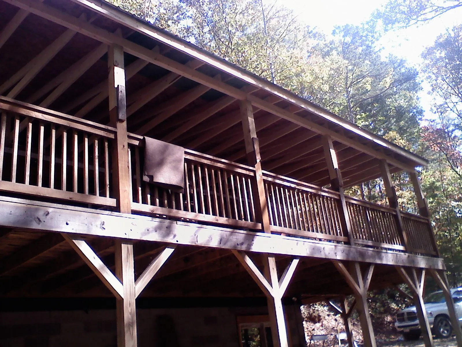 Timber framing under a new elevated porch and deck — Roof Leak Repair in Smiths Creek by Roofing Brothers